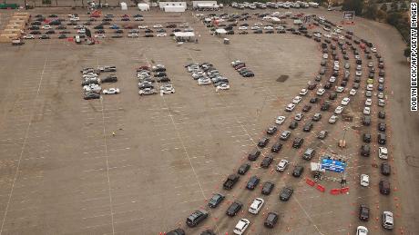 Drivers wait in lines at a Covid-19 testing site at Dodger Stadium in Los Angeles on Wednesday.