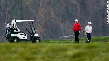 President Donald Trump plays golf in Sterling, Virginia on Saturday, November 21, 2020.