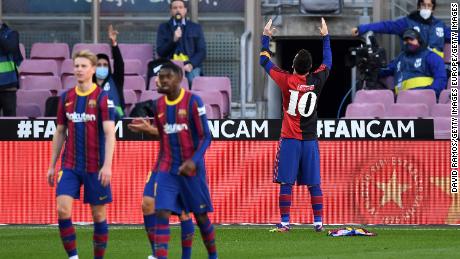 Lionel Messi celebrates after scoring in memory Diego Maradona.