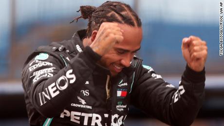 Hamilton celebrates after winning the Turkish Grand Prix. 