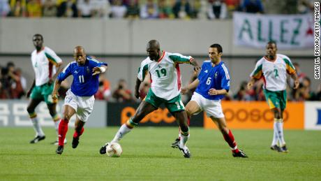 Diop playing in Senegal&#39;s shock victory over France at the 2002 World Cup.