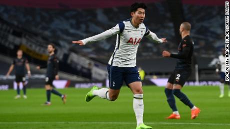 Son celebrates after scoring against Manchester City.
