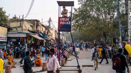 A policeman keeps vigil from a watchtower ahead of Diwali, the Hindu Festival of Lights, amid the Covid-19 coronavirus pandemic in New Delhi on November 6.