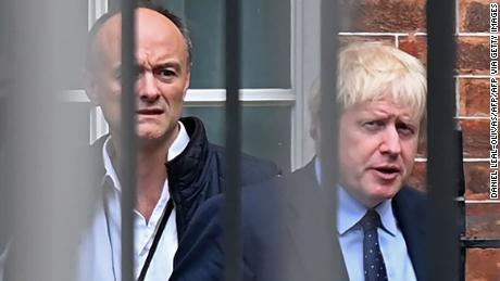 Boris Johnson leaves 10 Downing Street with Dominic Cummings before last year&#39;s general election.