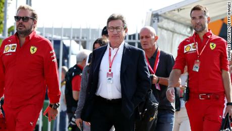 Louis Camilleri&#39;s (center) surprise resignation as CEO of Ferrari has cast doubt over Binotto&#39;s position as team principal.