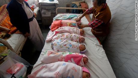 An Indian health official administers polio vaccination drops to newborn babies at a hospital in Agartala, India&#39;s northeastern state of Tripura.