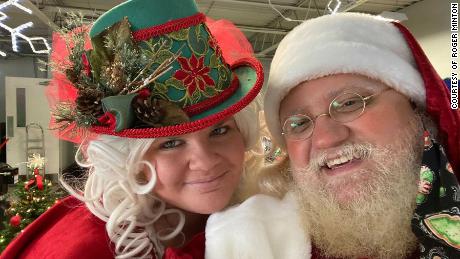 Roger Minton as Santa Claus and wife Erica Minton as Mrs. Claus.