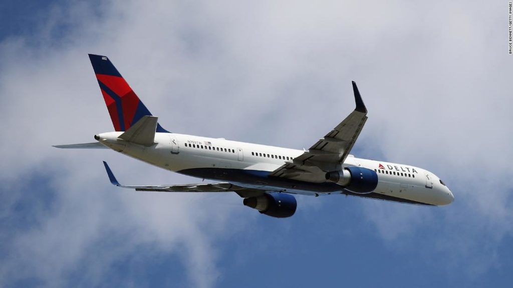 La Guardia: 2 Delta passengers open flight cabin door and slide out of moving plane with a dog