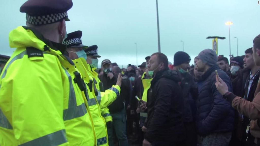 Tensions high in Dover as stranded drivers seen shouting at police