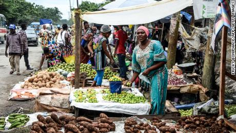 A vendor sells green peppers in Dar es Salaam, Tanzania, in April. According to the World Bank, poverty decreased more in Tanzania than any other country between 2000 and 2015.