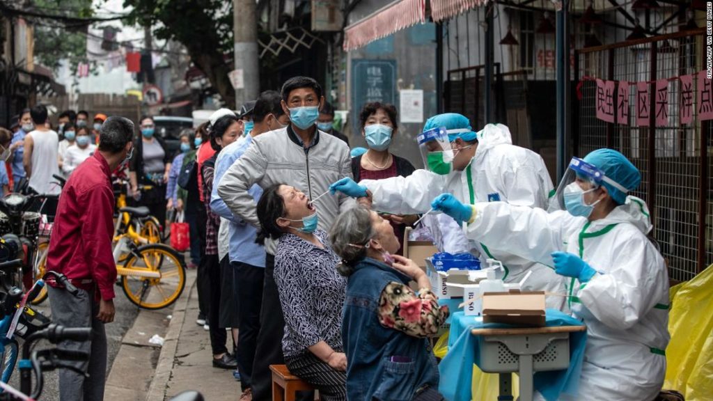 In Wuhan, nearly half a million people may have had Covid-19, study shows. That's almost 10 times the official figure