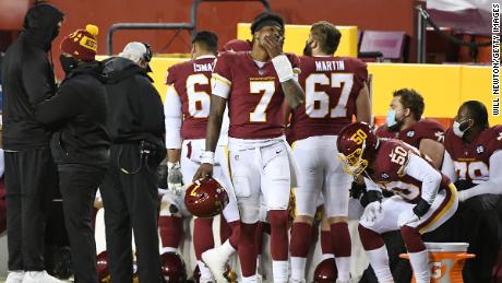 Dwayne Haskins #7 of the Washington Football Team reacts on the sideline against the Carolina Panthers.