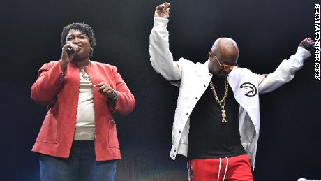 Then-gubernatorial contender Stacey Abrams appears with Dupri at 2018 concert in Atlanta. 