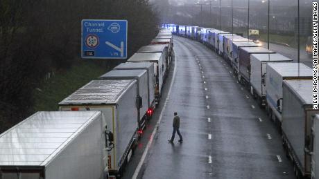 Trucks parked on the M20 near Folkestone, Kent, as part of Operation Stack after the Port of Dover was closed and access to the Eurotunnel terminal suspended.