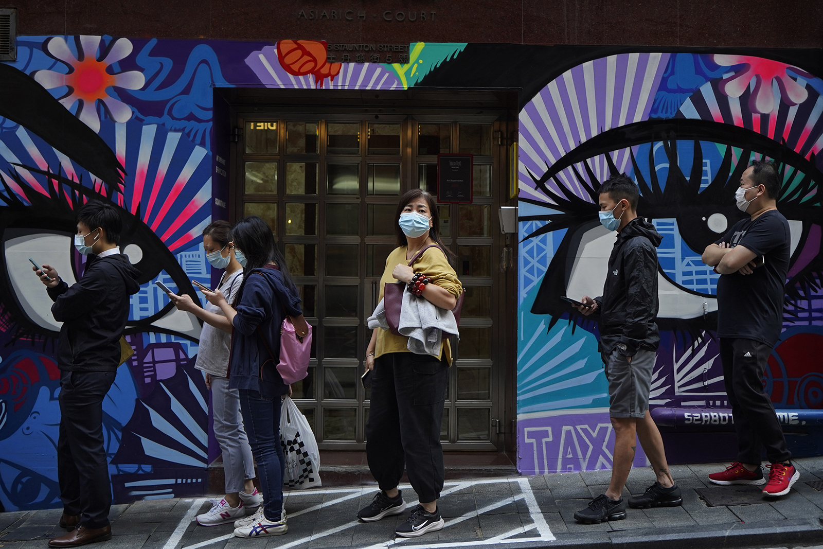 Hong Kong to impose dining curfew, close gyms and salons as Covid-19 cases continue to rise