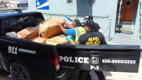 Marshall Islands police transport the confiscated packages of cocaine to an incinerator on December 15, 2020.