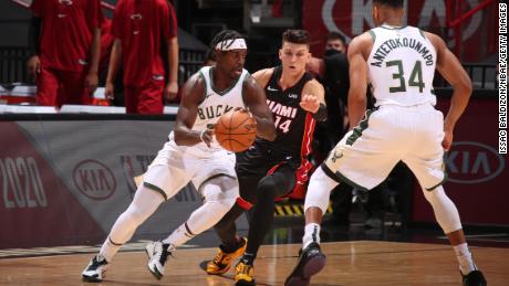 Jrue Holiday (left) led the Bucks in threes, making six of his 10 attempts.