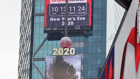 A countdown clock is seen behind the 2020 New Year&#39;s Eve numerals on December 21, 2020 in New York.