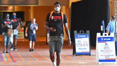 Paul George #13 of the LA Clippers arrives during practice as part of the NBA Restart 2020 on July 21, 2020 in Orlando, Florida. 