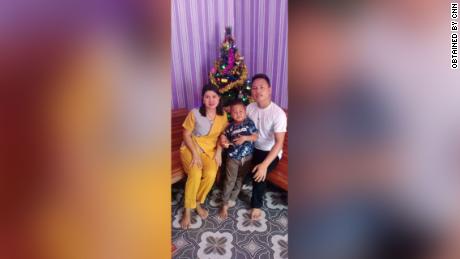 Yohanes Suherdi, 30, poses with his wife Susilawati Bungahilaria and their 5-year-old son, Rian Gusti Rafael, in this Christmas portrait. 