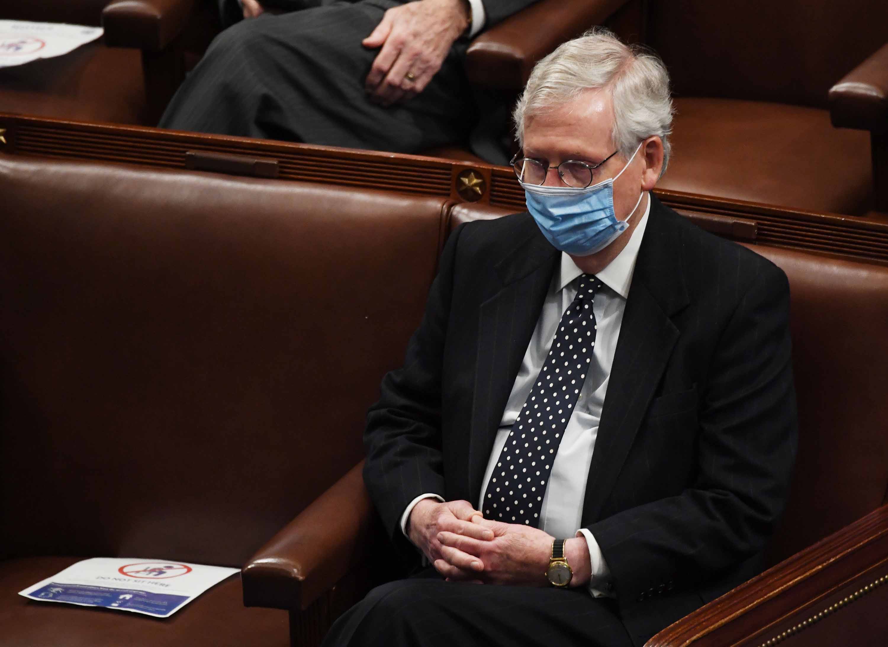 Senate Majority Leader Mitch McConnell attends a joint session of Congress after the session resumed, following the insurrection at the US Capitol in Washington, DC, on January 6.