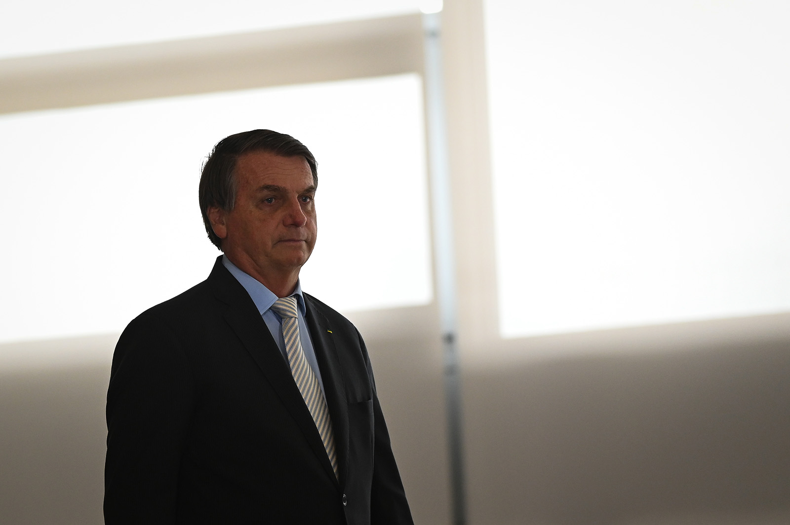 President of Brazil Jair Bolsonaro arrives for the opening ceremony of the forum "The Control in Combating Corruption" at Planalto Palace on December 9, 2020 in Brasilia. 