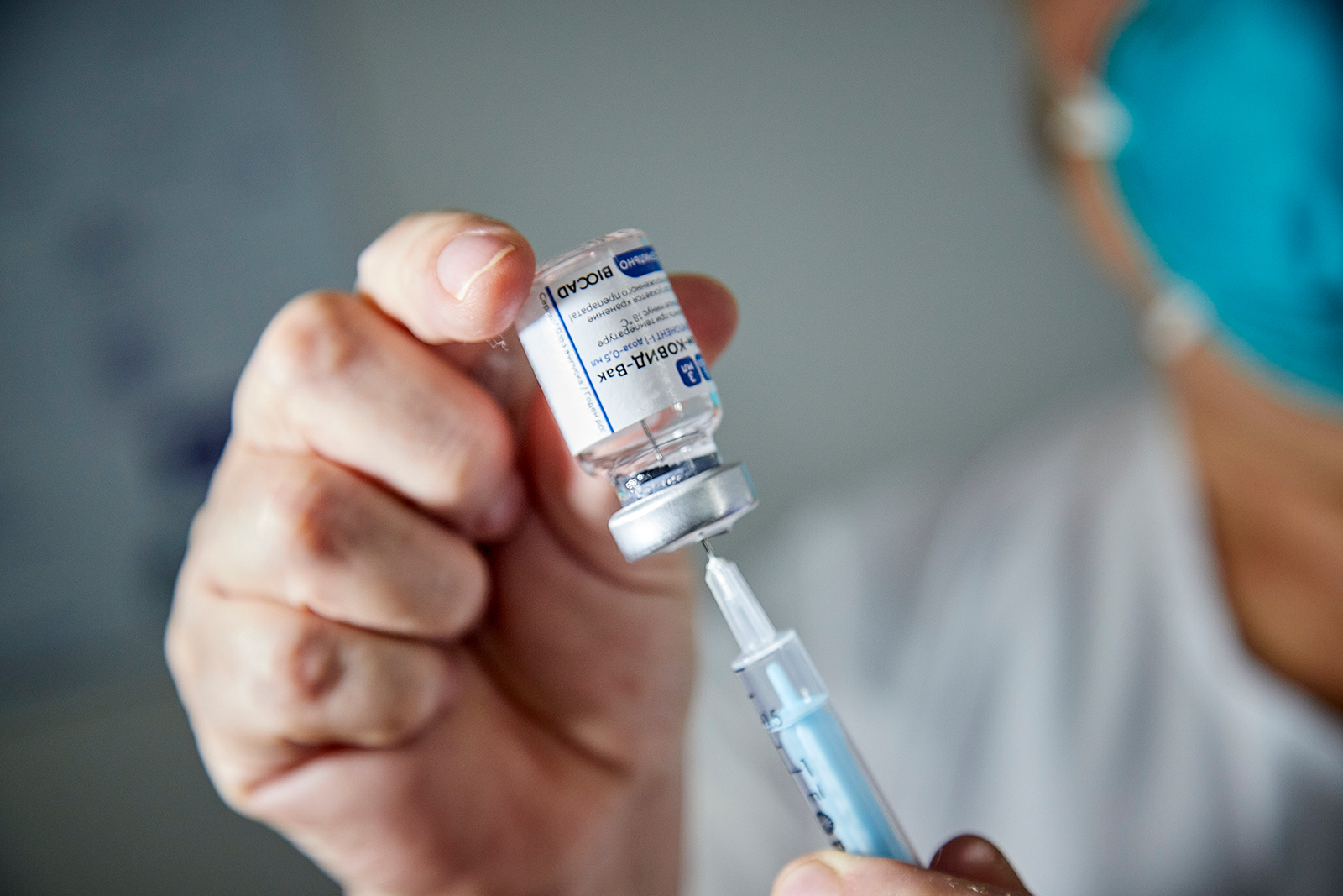 A health worker prepares the first dose of 'Gam-COVID-Vac', also known as Sputnik V vaccine, at Luis Lagomaggiore Hospital in Mendoza, Argentina, on December 29, 2020.