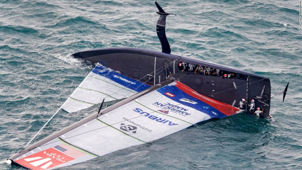 America's Cup: Patriot 'flying yacht' capsizes in gusty conditions