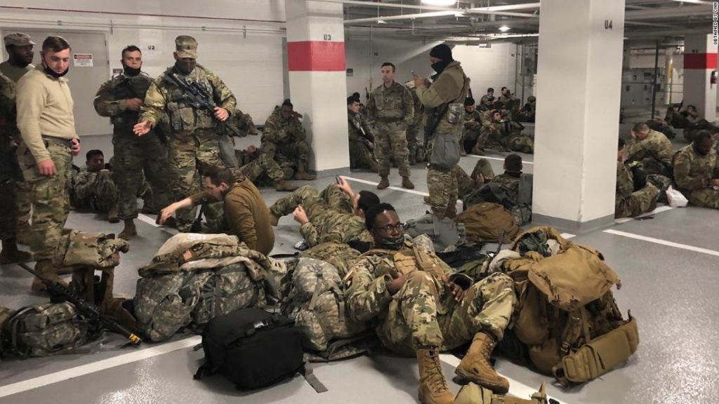 Thousands of National Guardsmen banished to parking garage