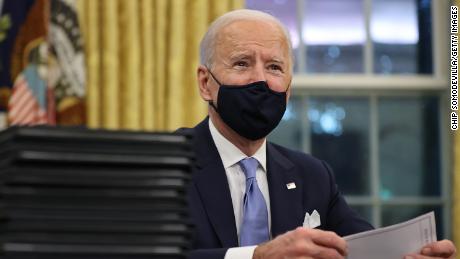Biden signs orders to get checks and food aid to low-income Americans -- plus a federal pay raise