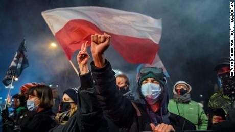 A demonstrator gestures as people take part in a pro-choice protest in the center of Warsaw, on January 27, as part of a nationwide wave of protests against Poland&#39;s near-total ban on abortion.