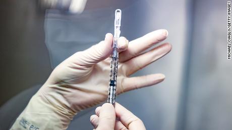 White House cautions providers against holding back vaccine doses