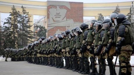 Police block the way during a protest against the detention of Navalny in Volgograd, Russia, on Sunday.