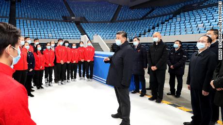 Chinese President Xi Jinping talks with athletes and coaches of China&#39;s national figure skating and short track speed skating teams while visiting the Capital Gymnasium in Haidian District, Beijing, on January 18.