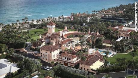 With Trump a no-show, Mar-a-Lago guests left to party maskless with Rudy Giuliani and Vanilla Ice