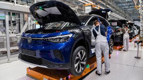 Workers assemble the new ID.4 at a Volkswagen factory in Zwickau, Germany. Motor vehicles were Germany&#39;s main export in 2019, according to official figures.