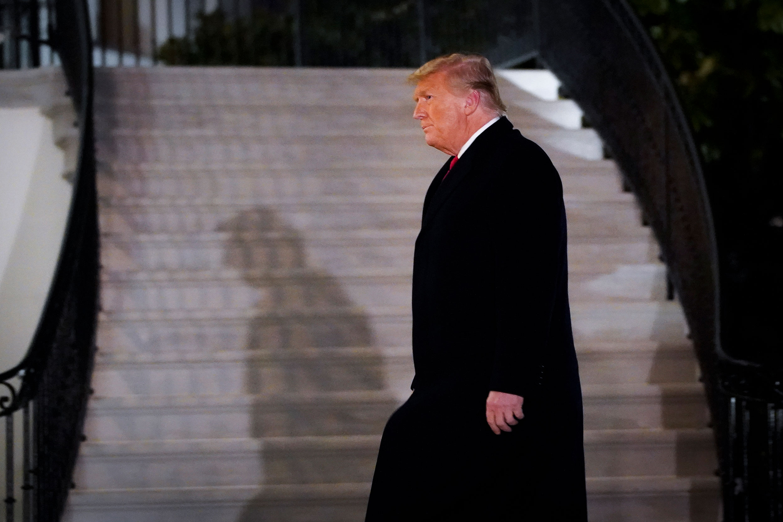 President Trump arrives at the White House on January 12.