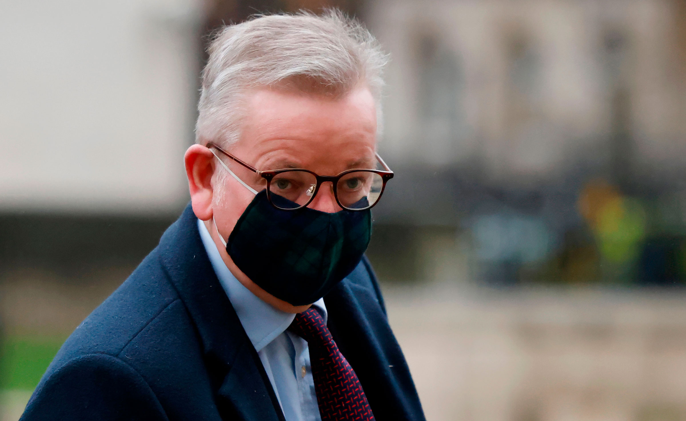 Cabinet Office Minister Michael Gove arrives at the Cabinet Office on December 21 in London.