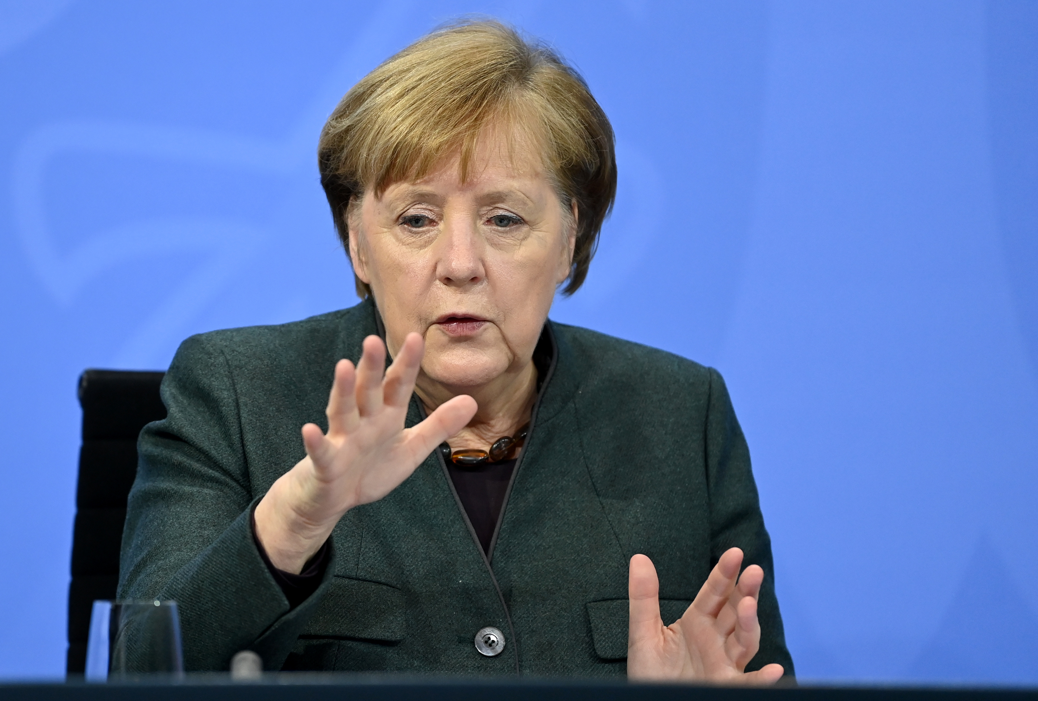 German Chancellor Angela Merkel speaks at a press conference following a video conference with the Prime Ministers of the federal states discussing new measures to bring down the numbers of Covid-19 infections on January 19.