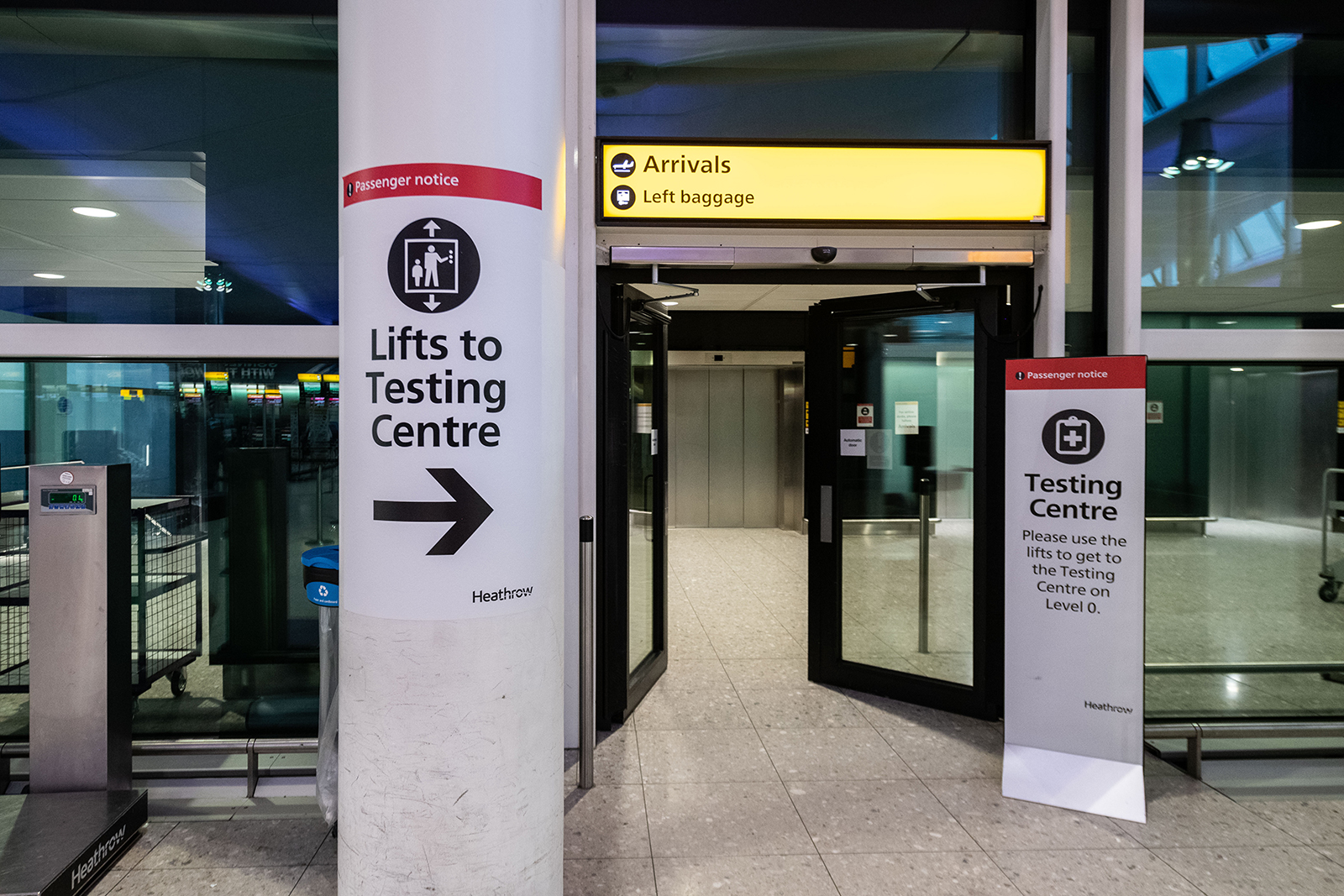 A view of signage leading to one of the testing centers at Heathrow Airport in London, on December 22.