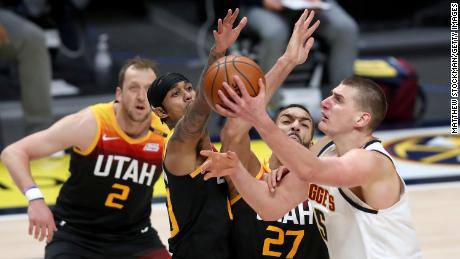 Nikola Jokic of the Denver Nuggets goes to the basket against the Utah Jazz.