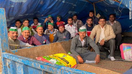 Down time in Ghazipur as farmers gather together outside of a makeshift tent, on February 4, 2021.