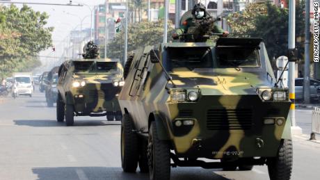 Armoured personnel carriers are seen on the streets of Mandalay on February 3, 2021.