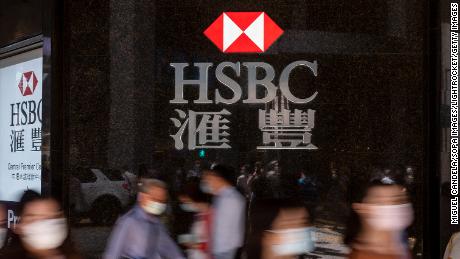 HSBC plans to speed up restructuring as profits drop 36%