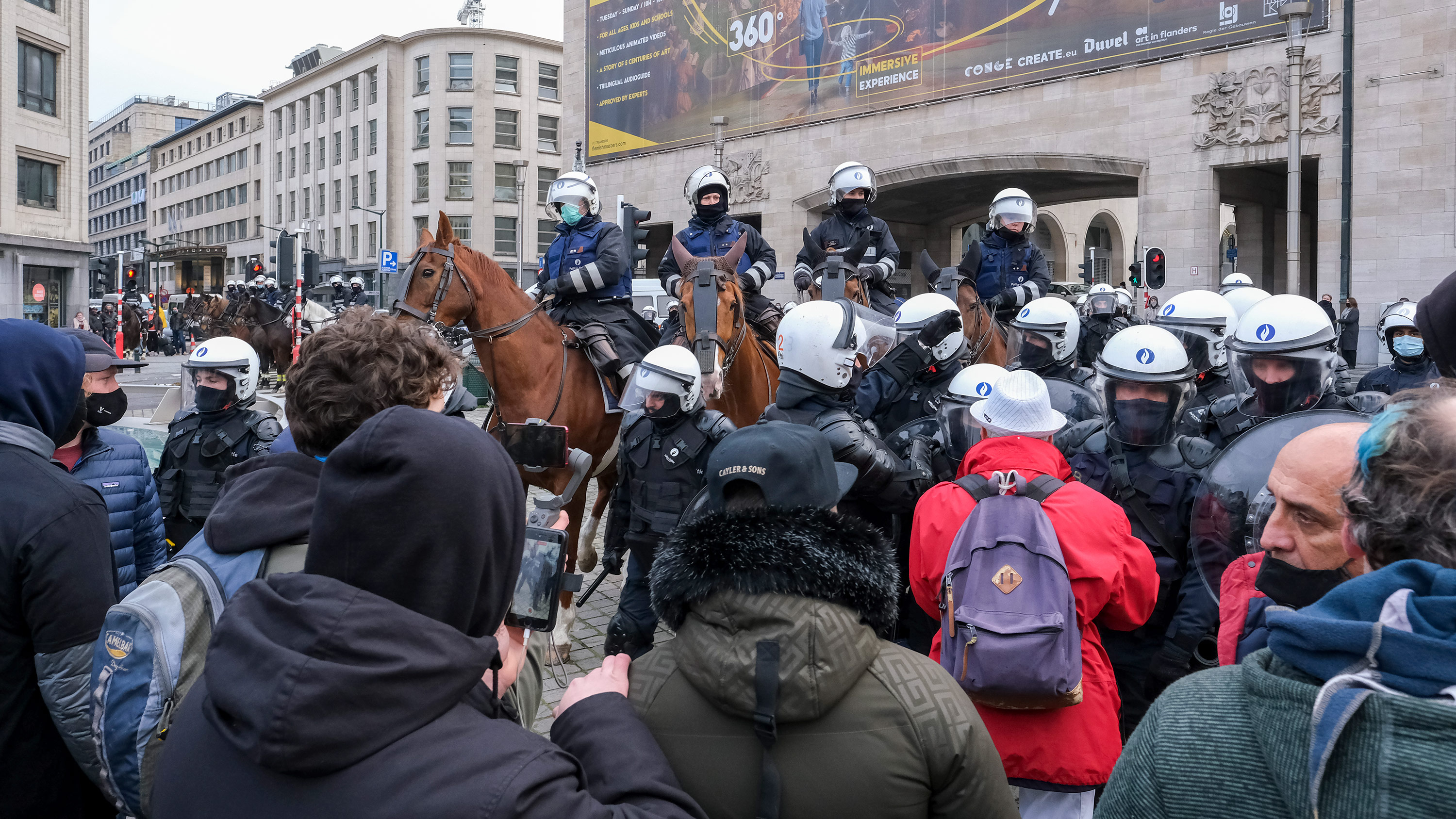 Police monitor an anti-lockdown protest in Brussels, on Sunday, January 31. 