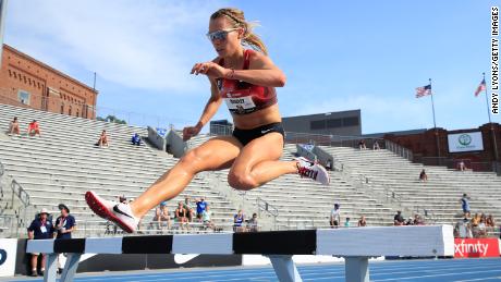 Quigley clears a hurdle during the 2019 USATF outdoor championships in Des Moines, Iowa.