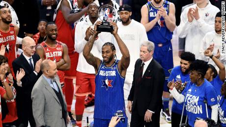 Kawhi Leonard of Team LeBron celebrates with the trophy after being named the Kobe Bryant MVP during the 69th NBA All-Star Game in 2020.