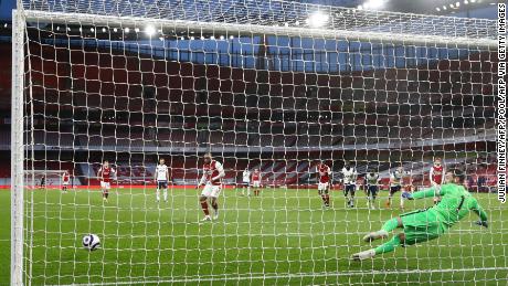Lacazette shoots from the penalty spot to score his team&#39;s second goal.