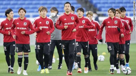Members of Japan&#39;s national football team train in Yokohama.
