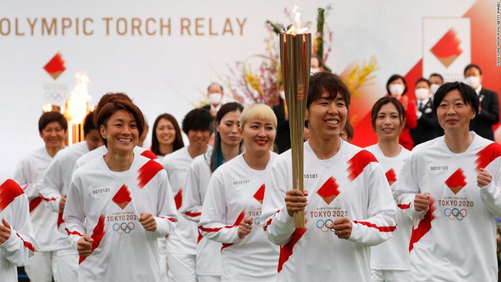 Japan's Olympic torch relay starts its final leg to Tokyo but some suggest this day should never have come